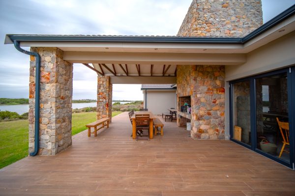 Residential Architect Rustic Farm House Style House along River with Exposed Roof Trusses Design Jeffreys Bay Wavecrest Eastern Cape Holiday House